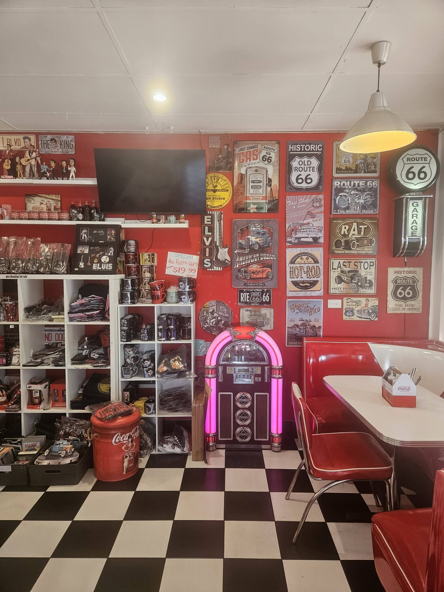 A glowing retro jukebox in the corner